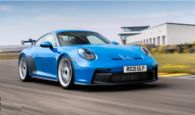 Porsche 911 GT3 (992.1) on track with its aggressive design and dynamic performance.