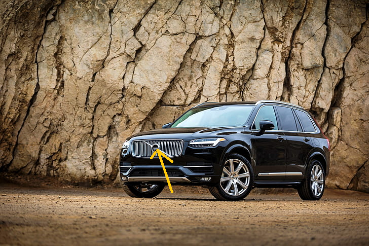 Volvo EX90 electric SUV showcasing sleek design, spacious seven-passenger interior, and sustainable features.